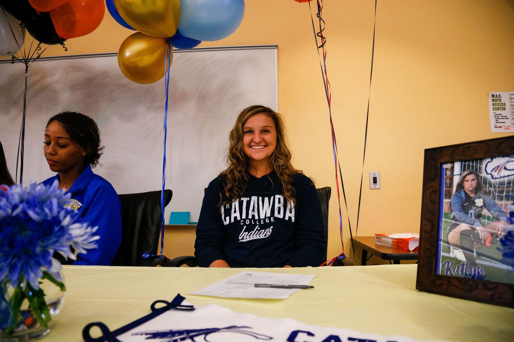 SIGNING DAY: Rampart athletes sign their National Letter of Intent
